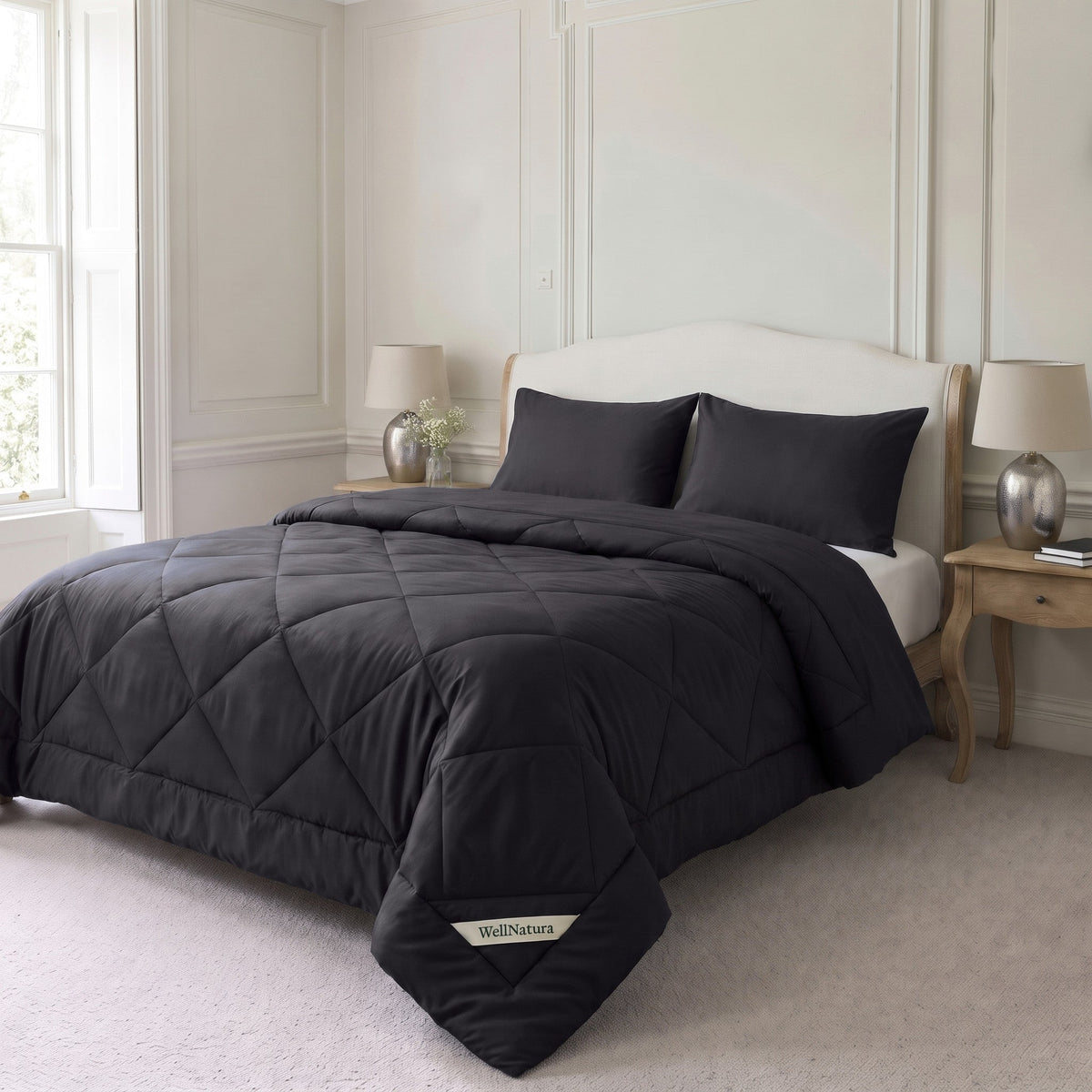 Black WellNatura coverless duvet on a made double bed with two matching pillowcases #Colour_Black