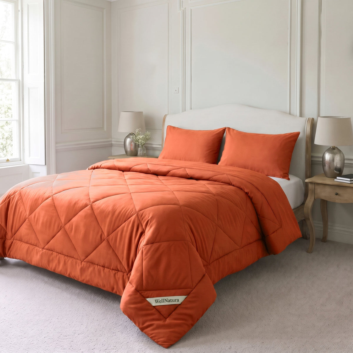 Burnt Orange WellNatura coverless duvet on a made double bed with two matching pillowcases #Colour_Burnt Orange