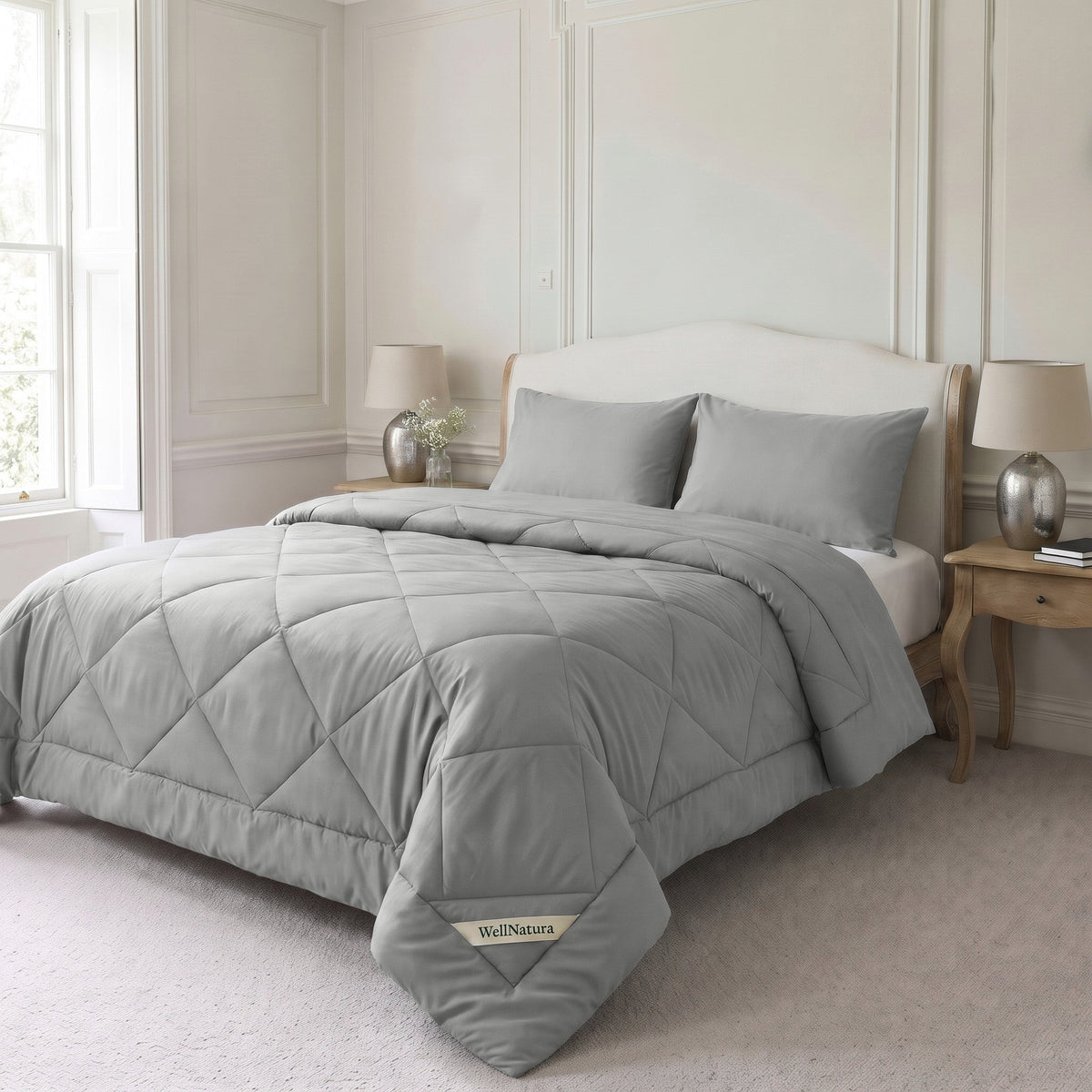 Soft Grey WellNatura coverless duvet on a made double bed with two matching pillowcases #Colour_Soft Grey