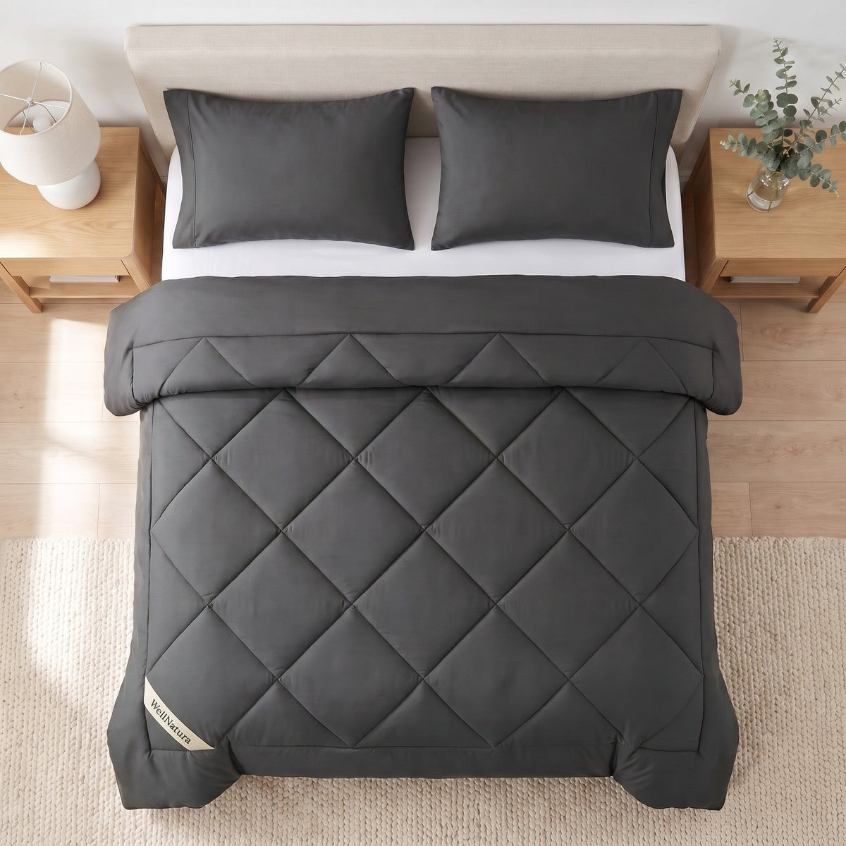 Charcoal WellNatura coverless duvet seen from above, big diamond quilting and a stitched border line #Colour_Charcoal