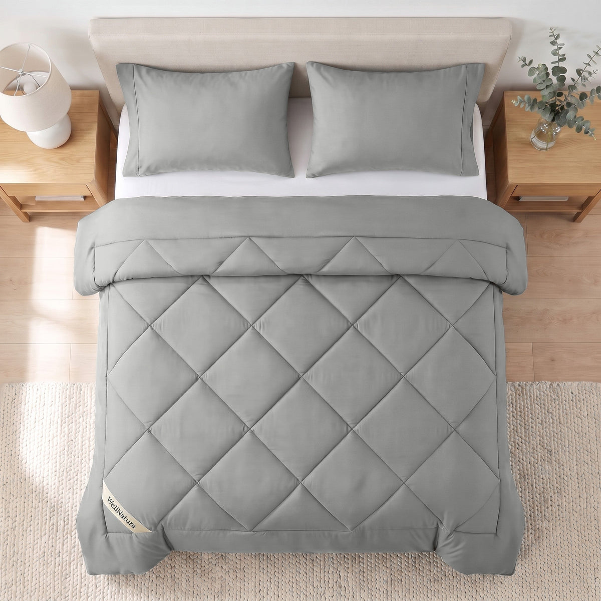 Soft Grey WellNatura coverless duvet seen from above, big diamond quilting and a stitched border line #Colour_Soft Grey