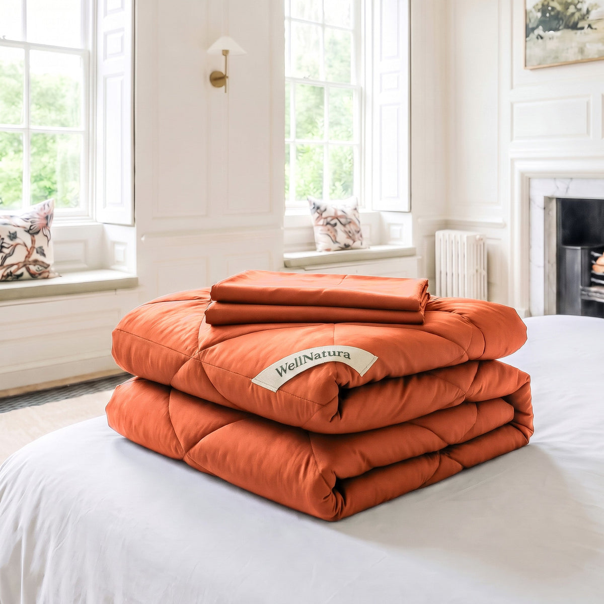 Burnt Orange WellNatura coverless duvet folded, with its two free matching pillowcases on top #Colour_Burnt Orange