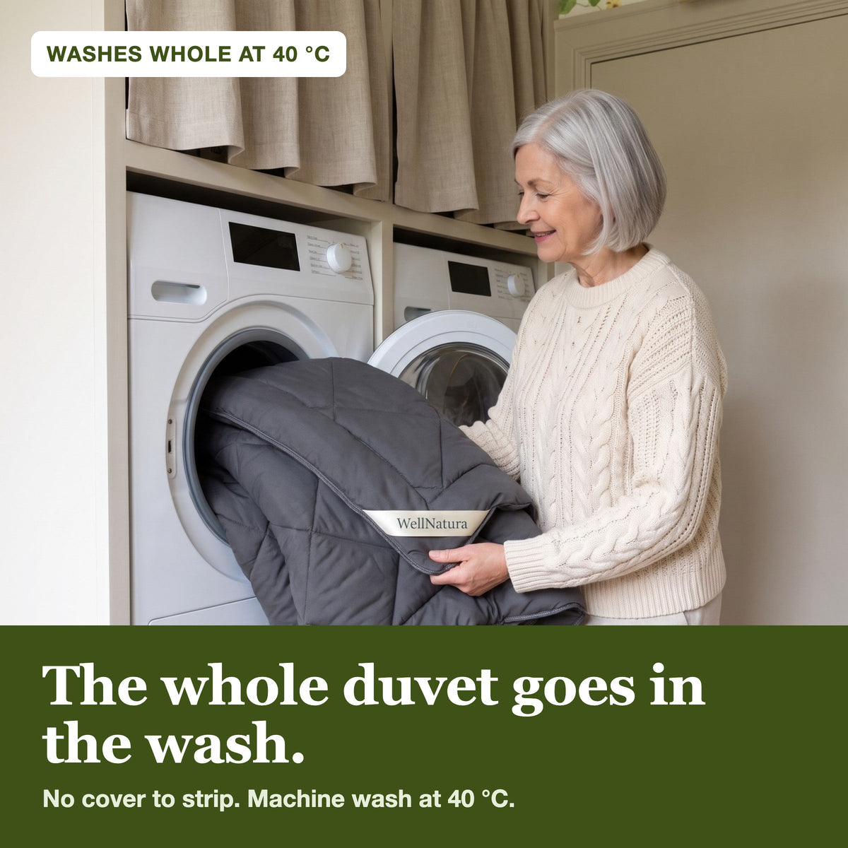 A woman loads the whole WellNatura coverless duvet into a front-loading washing machine